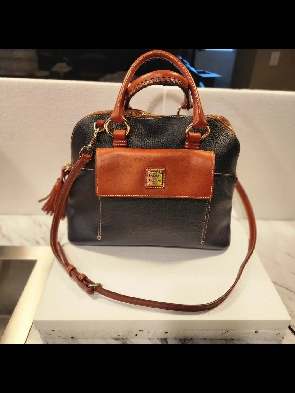 Dooney & Bourke Black Satchel with Brown Trim and Tassel
